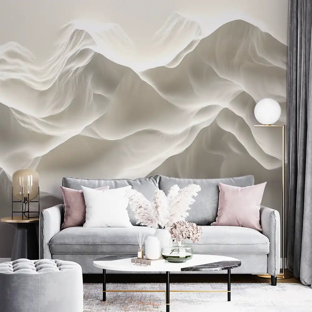 Stylish living room featuring a soothing beige mountain mural, soft grey couch, and modern decor accents.