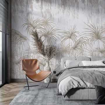 Elegant bedroom featuring a botanical wallpaper, cozy bedding, and a stylish chair for a modern home decor.