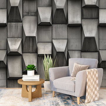 Фототапет бетонни скули индустриален стил в интериор с кресло и масичка за кафе.