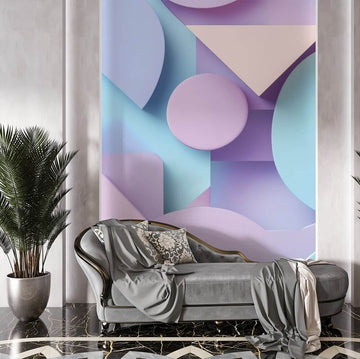 Геометрични фототапети за хол с нежни акварелни форми в синьо и лилаво върху стената.