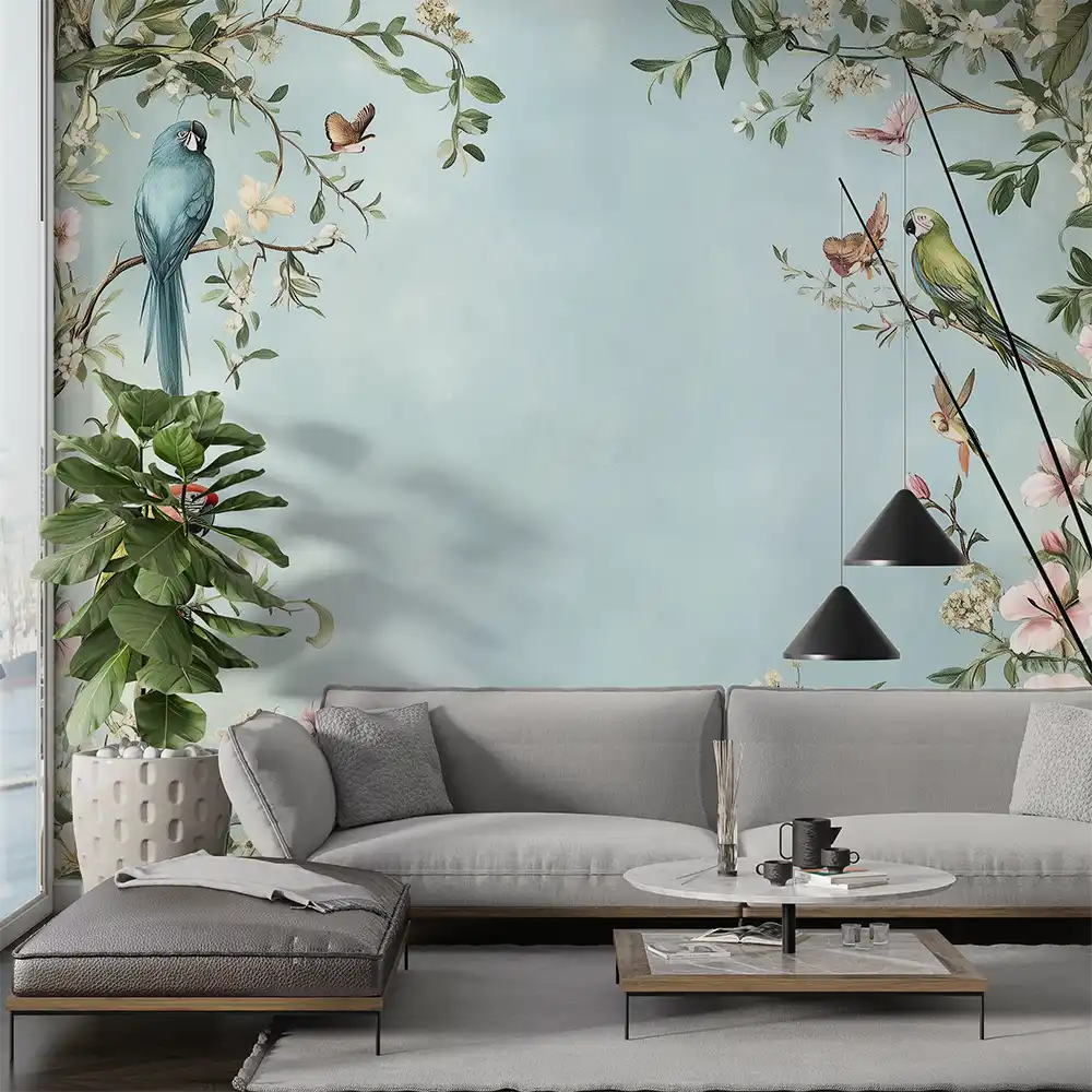 Stylish living room with blue floral wallpaper featuring birds, modern furniture, and indoor plants.