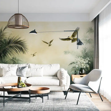 Green oasis wall mural with birds in a modern living room featuring minimalist furniture.