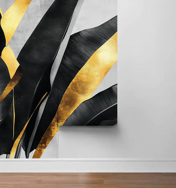 Elegant black leaves with gold accents on a modern wall, adding luxury to interior decor.