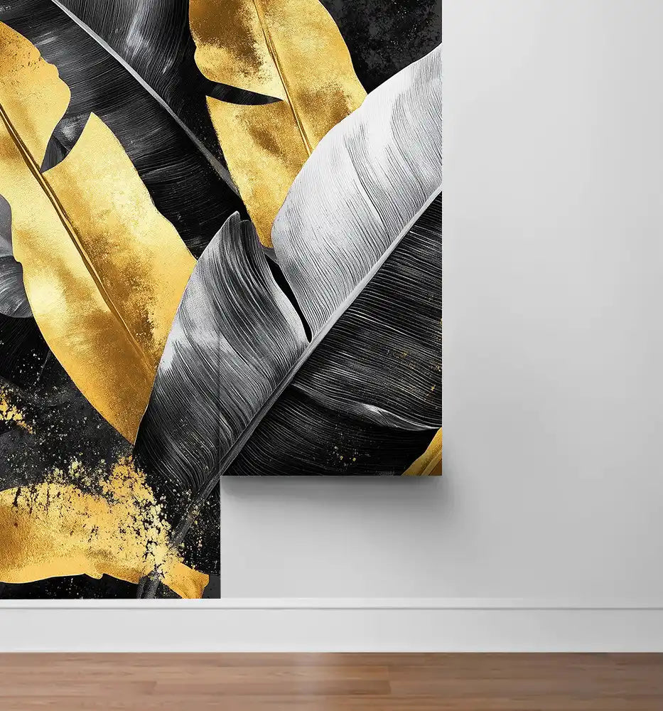 Elegant wallpaper featuring black and gold tropical leaves, enhancing interior decor with a luxurious touch.