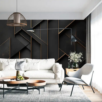 Stylish black and gold geometric wallpaper in a modern living room decor with cozy furnishings.